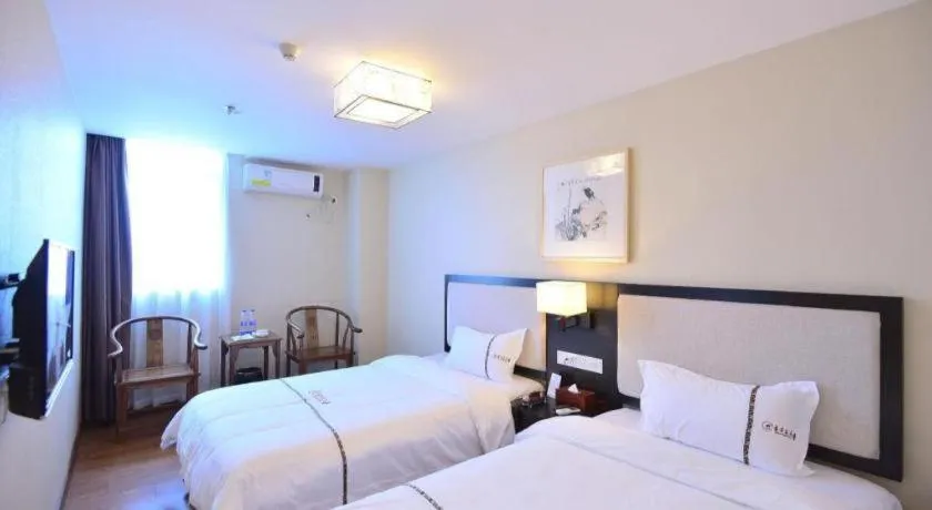 Bed in BOOK PAVILION HOTEL