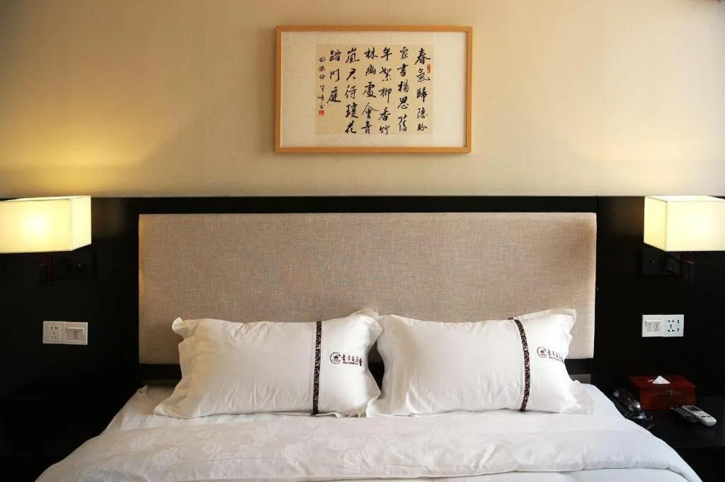 Bed in BOOK PAVILION HOTEL