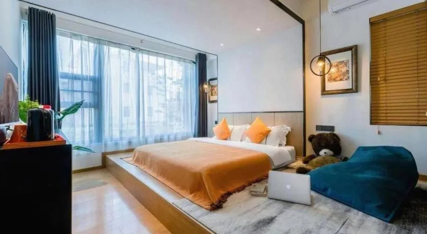 Bed in BOOK PAVILION HOTEL