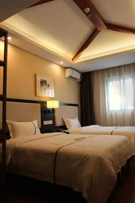 Bed in BOOK PAVILION HOTEL