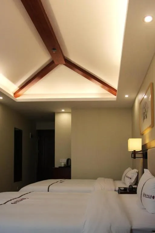 Bed in BOOK PAVILION HOTEL