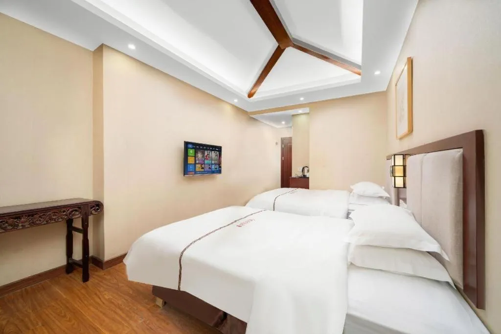 Bed in BOOK PAVILION HOTEL