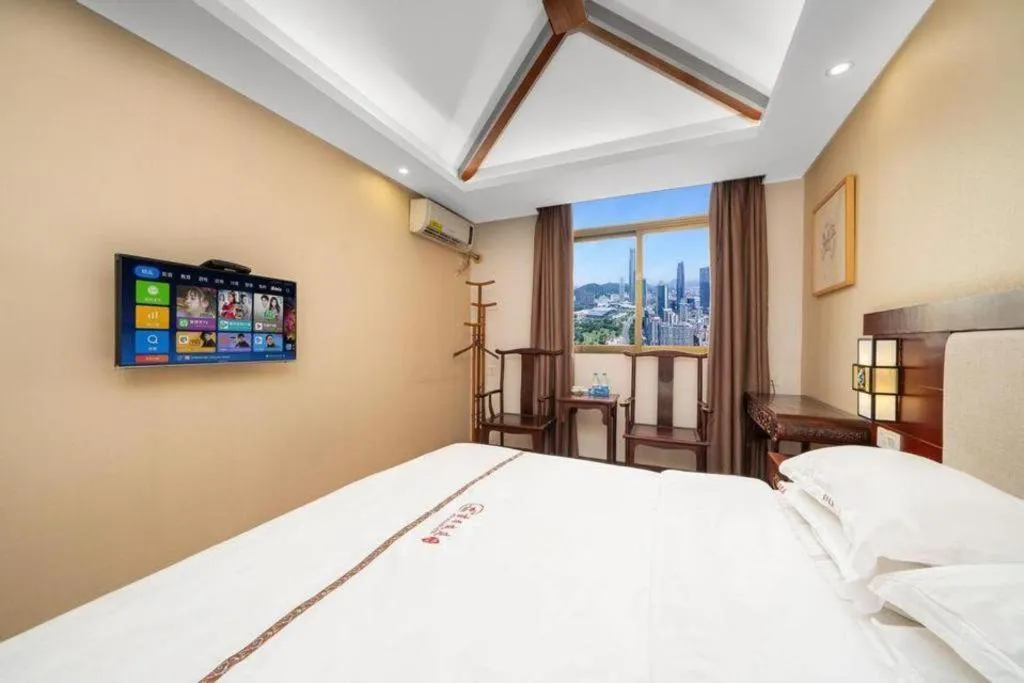 Bed in BOOK PAVILION HOTEL