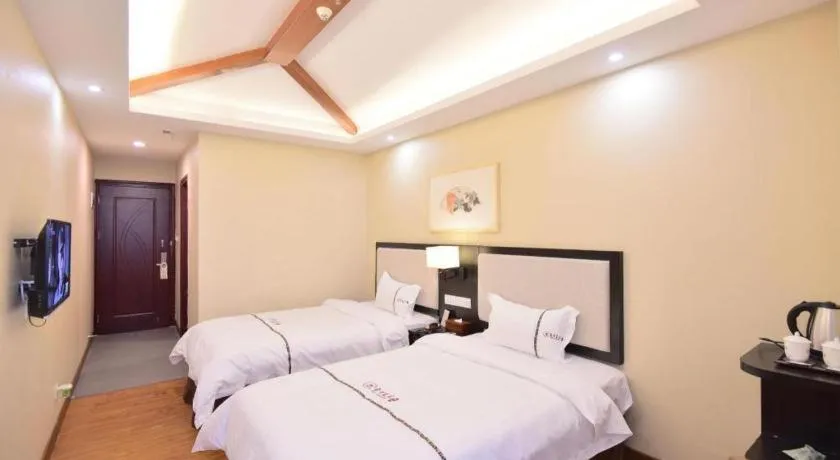 Bed in BOOK PAVILION HOTEL