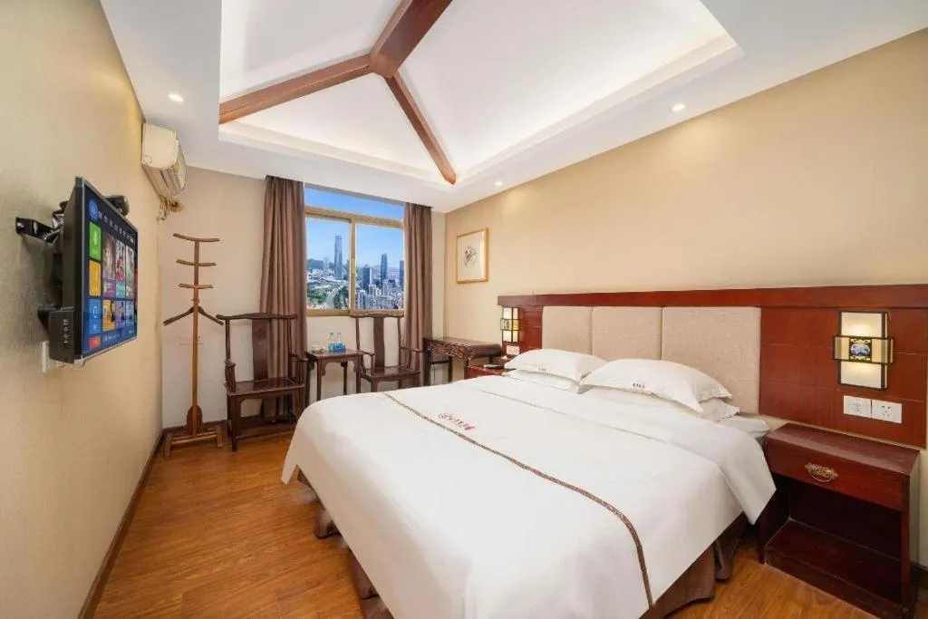 Bed in BOOK PAVILION HOTEL