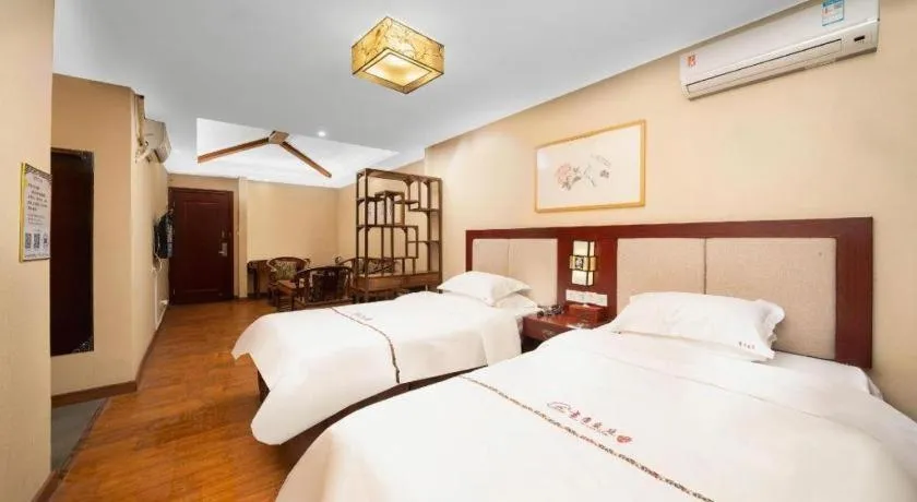 Bed in BOOK PAVILION HOTEL