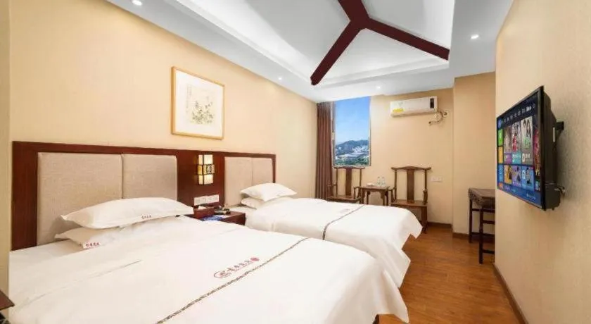 Bed in BOOK PAVILION HOTEL