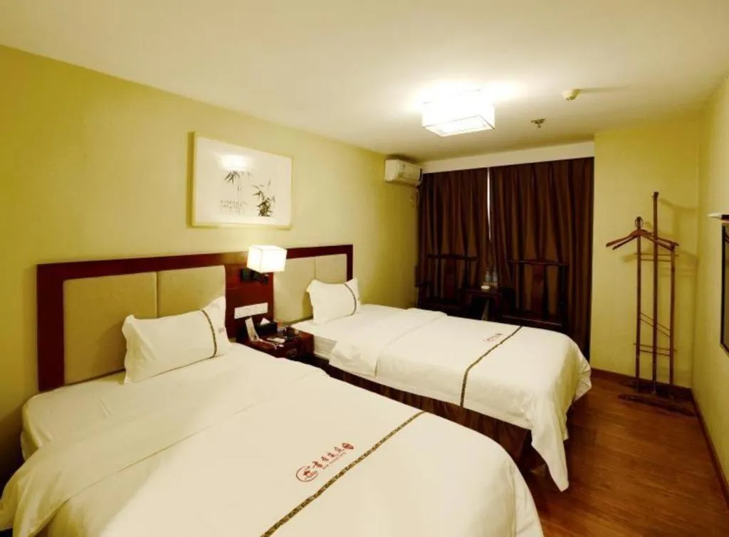 Bed in BOOK PAVILION HOTEL