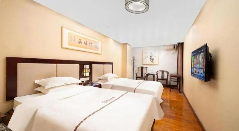 Bed in BOOK PAVILION HOTEL