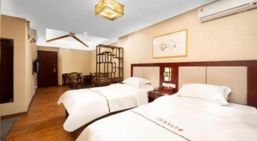 Bed in BOOK PAVILION HOTEL
