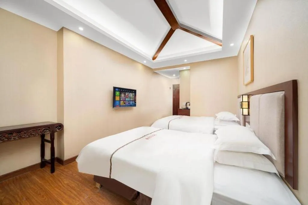 Bed in BOOK PAVILION HOTEL