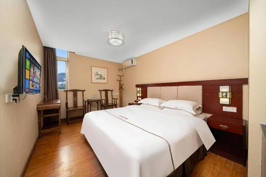 Bed in BOOK PAVILION HOTEL