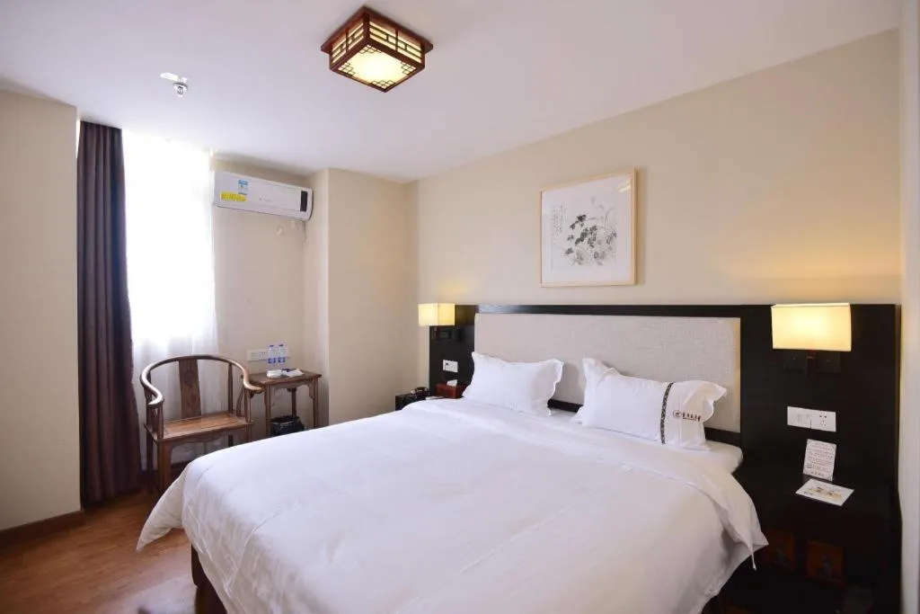 Bed in BOOK PAVILION HOTEL