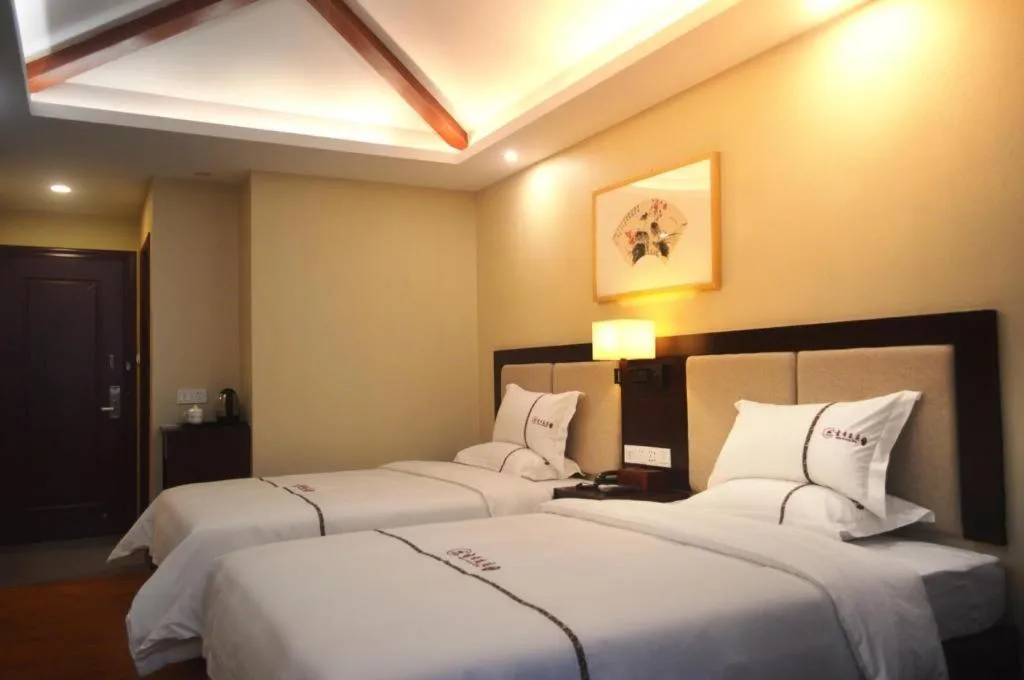 Bed in BOOK PAVILION HOTEL