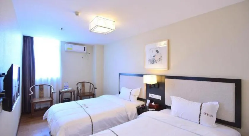 Bed in BOOK PAVILION HOTEL