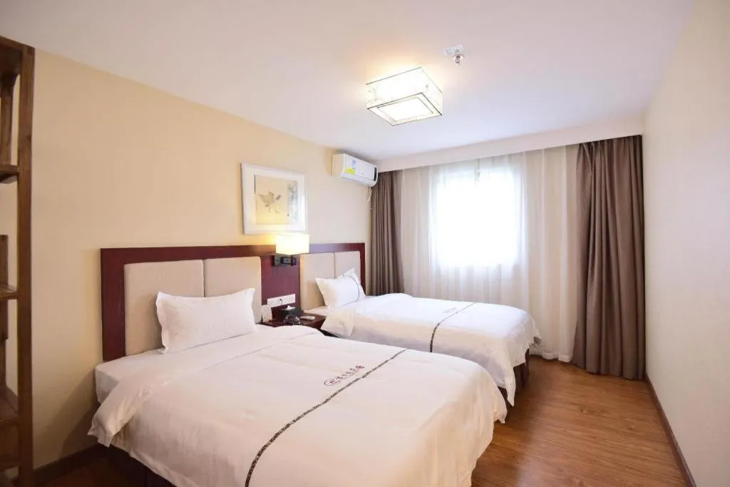 Bed in BOOK PAVILION HOTEL