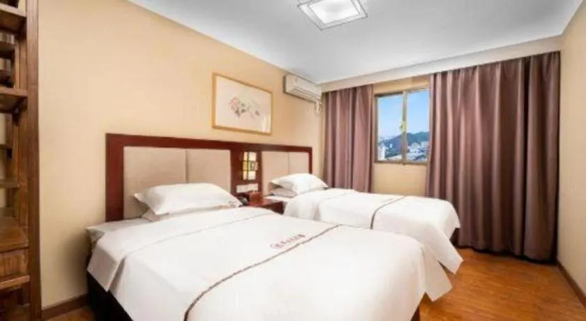 Bed in BOOK PAVILION HOTEL