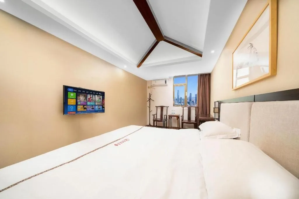 Bed in BOOK PAVILION HOTEL