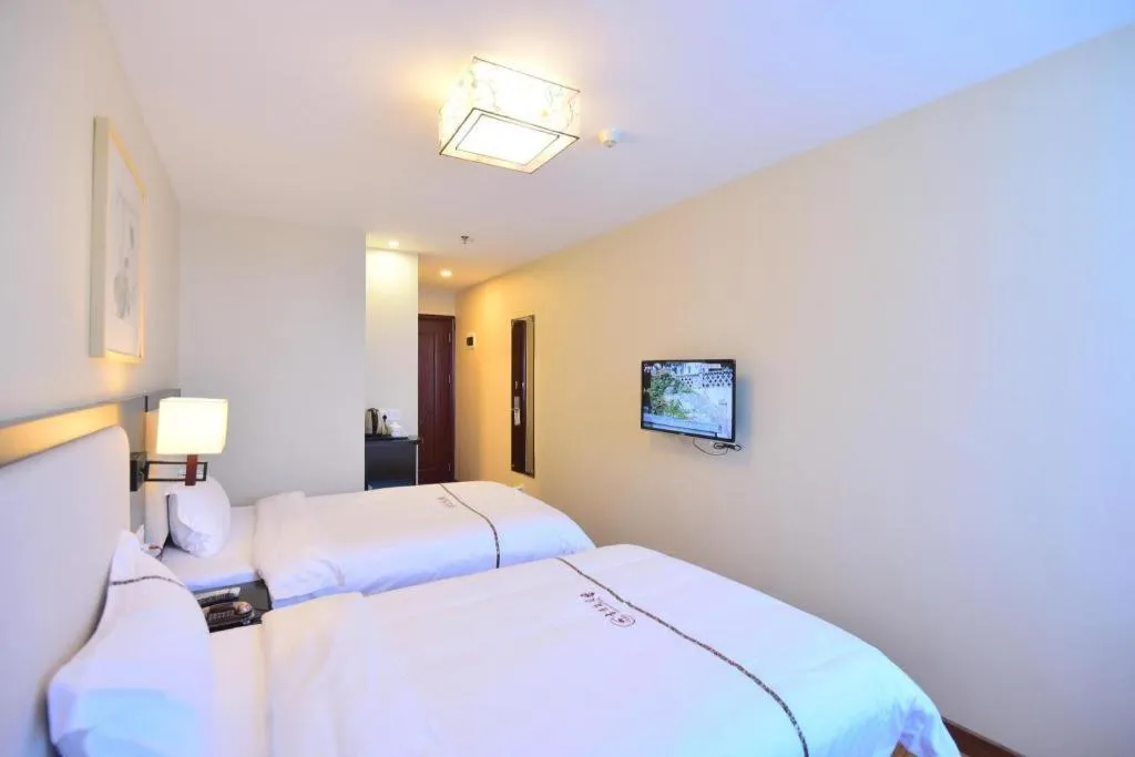 Bed in BOOK PAVILION HOTEL