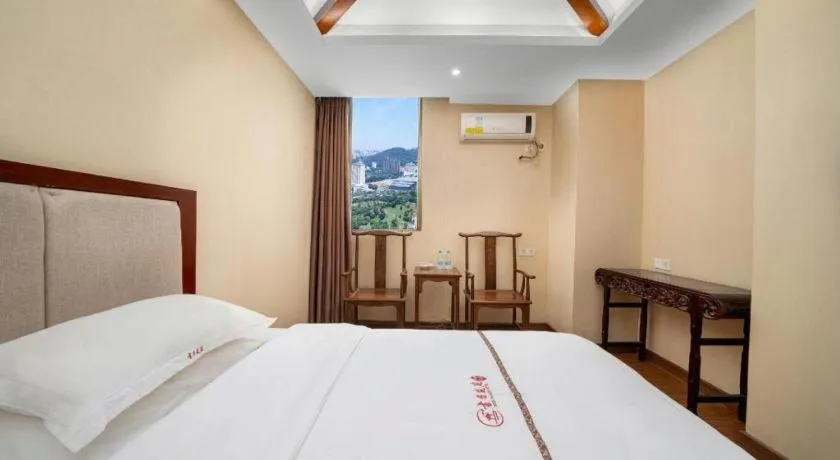 Bed in BOOK PAVILION HOTEL