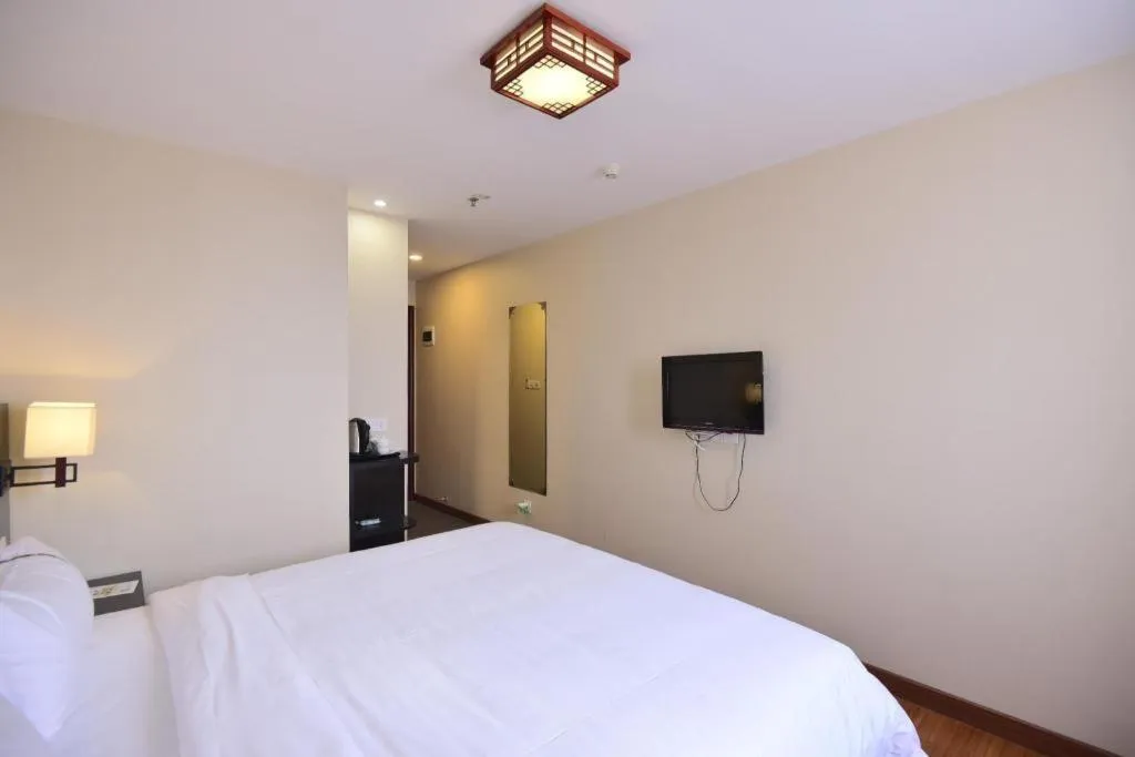 Bed in BOOK PAVILION HOTEL