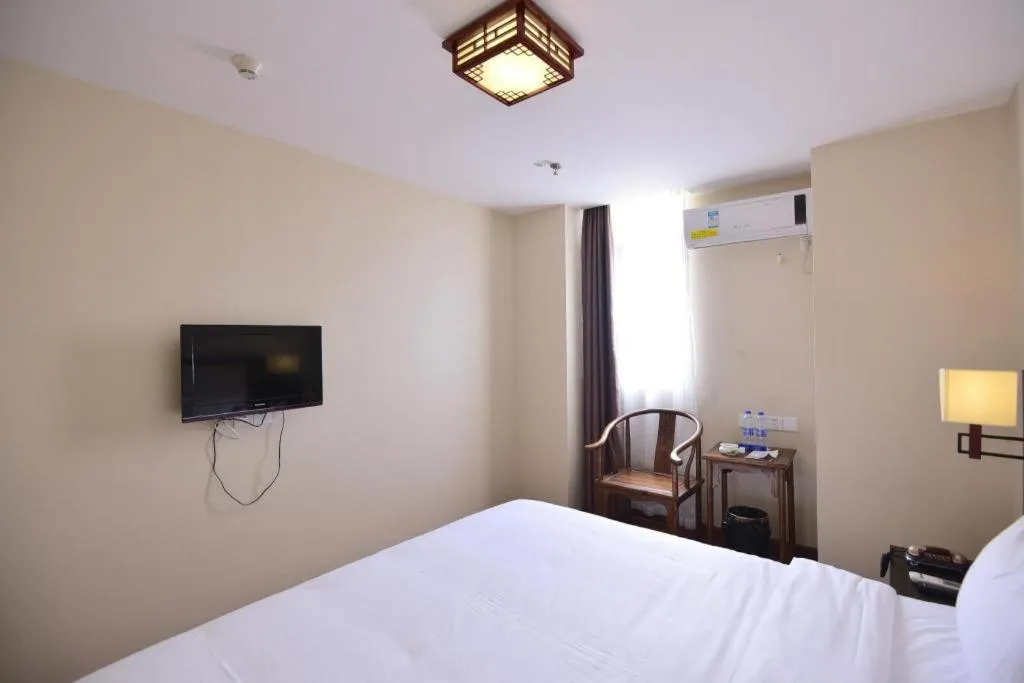 Bed in BOOK PAVILION HOTEL