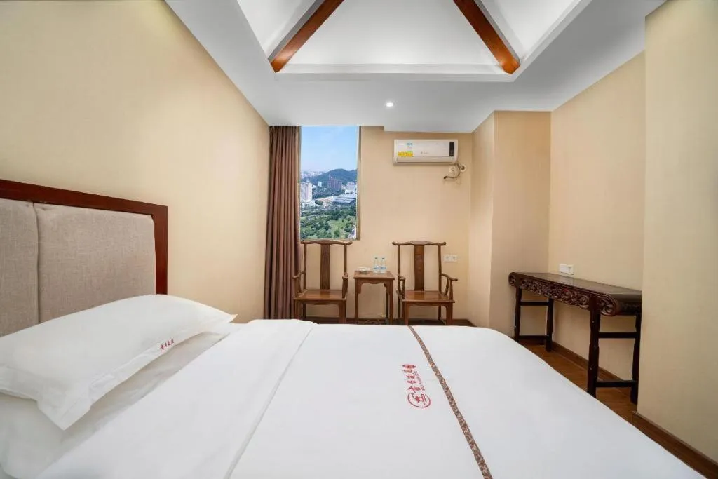 Bed in BOOK PAVILION HOTEL