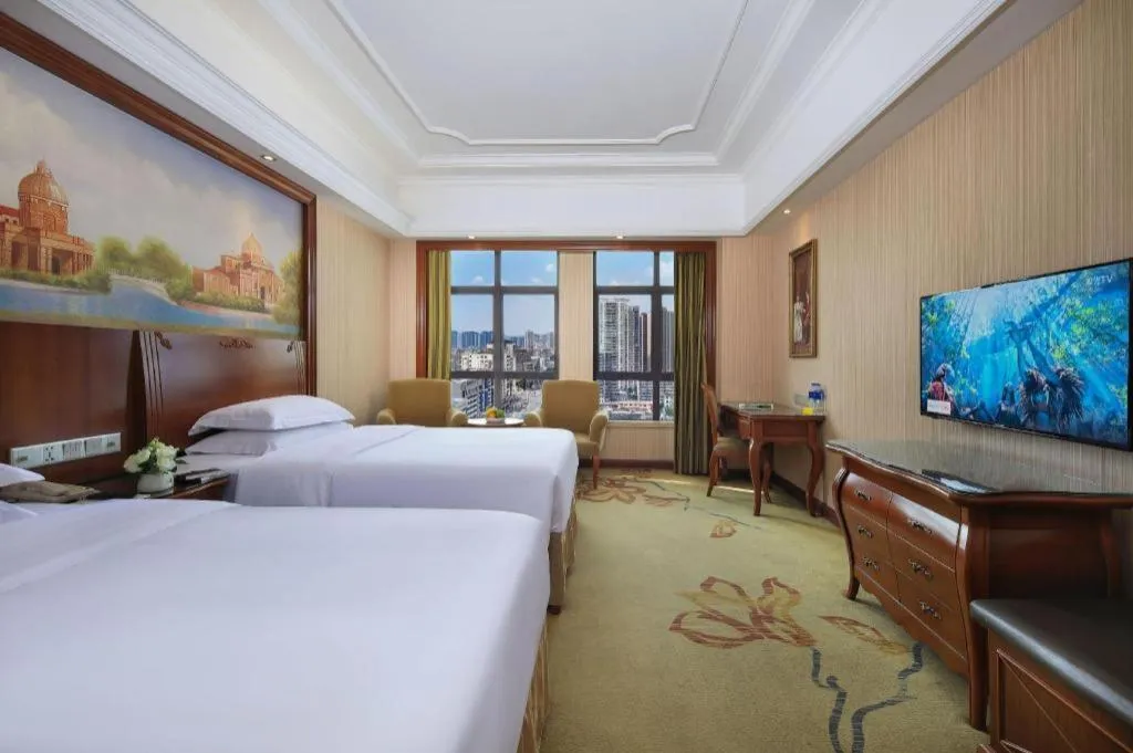 Bed in Vienna International Hotel Nanning Railway Station Mingxiu Road Metro Station