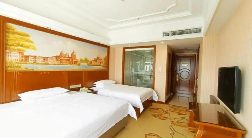 Bed in Vienna International Hotel Nanning Railway Station Mingxiu Road Metro Station
