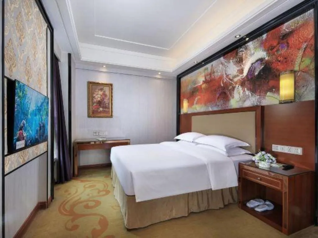 Bed in Vienna International Hotel Nanning Railway Station Mingxiu Road Metro Station