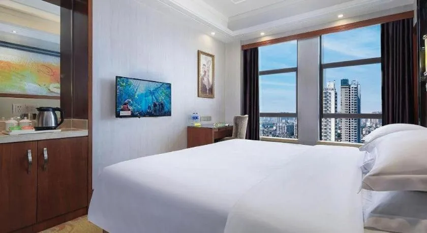 Bed in Vienna International Hotel Nanning Railway Station Mingxiu Road Metro Station