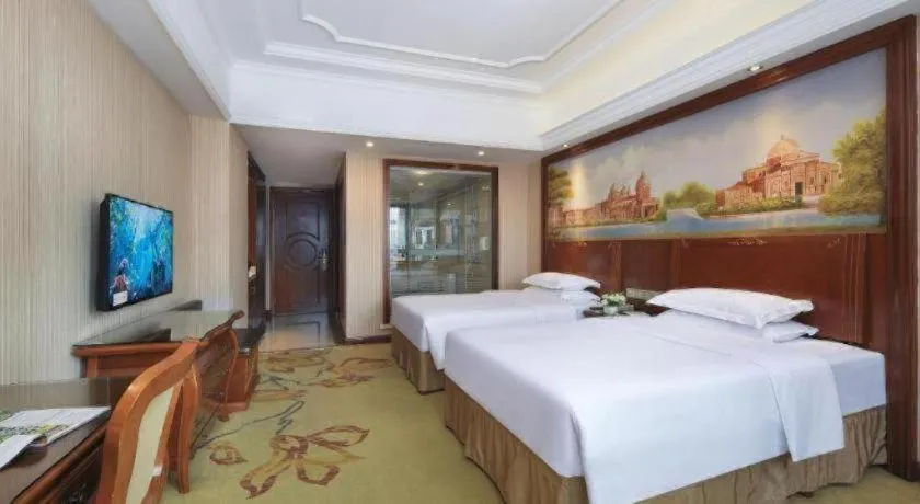 Bed in Vienna International Hotel Nanning Railway Station Mingxiu Road Metro Station