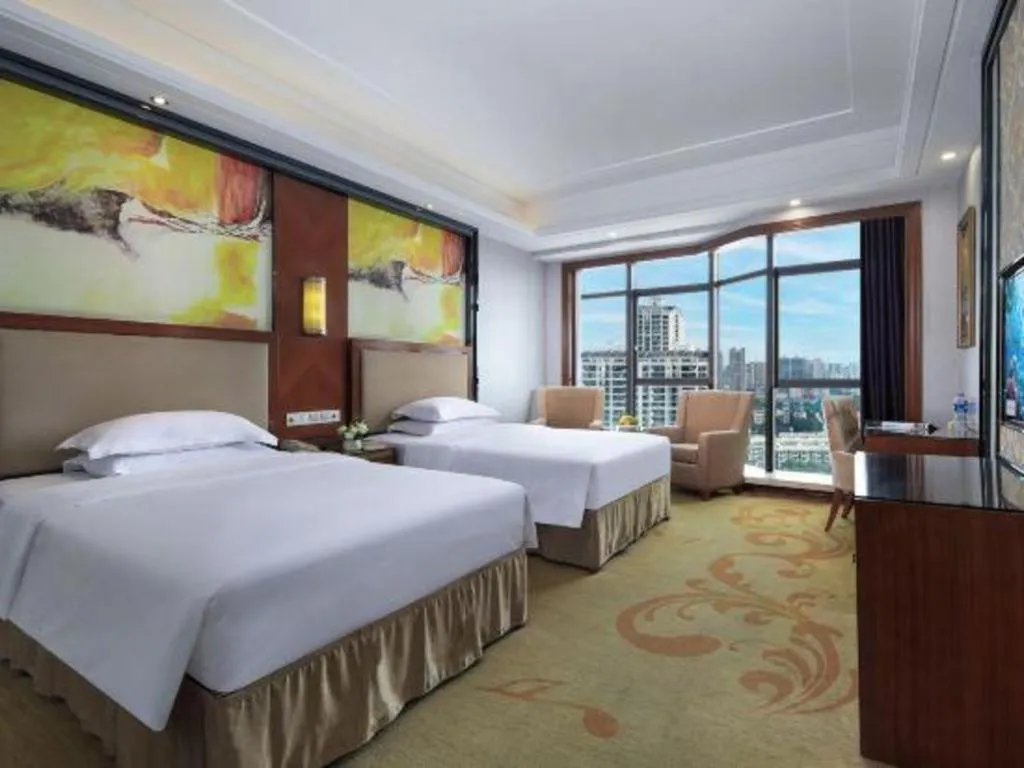 Bed in Vienna International Hotel Nanning Railway Station Mingxiu Road Metro Station