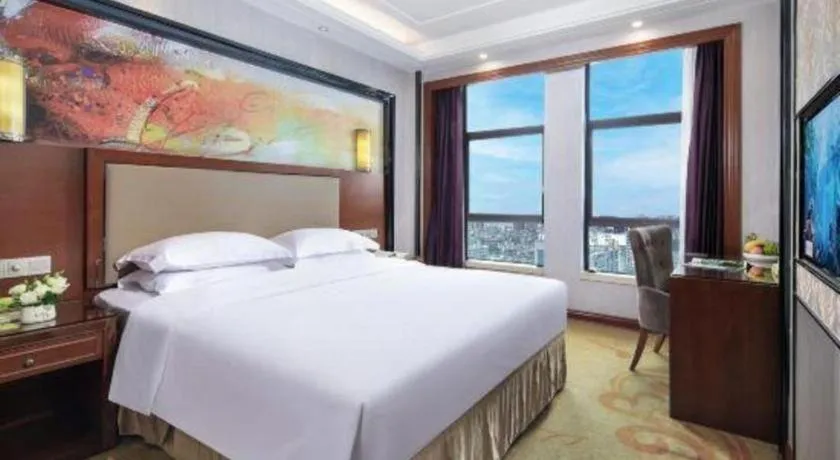 Bed in Vienna International Hotel Nanning Railway Station Mingxiu Road Metro Station