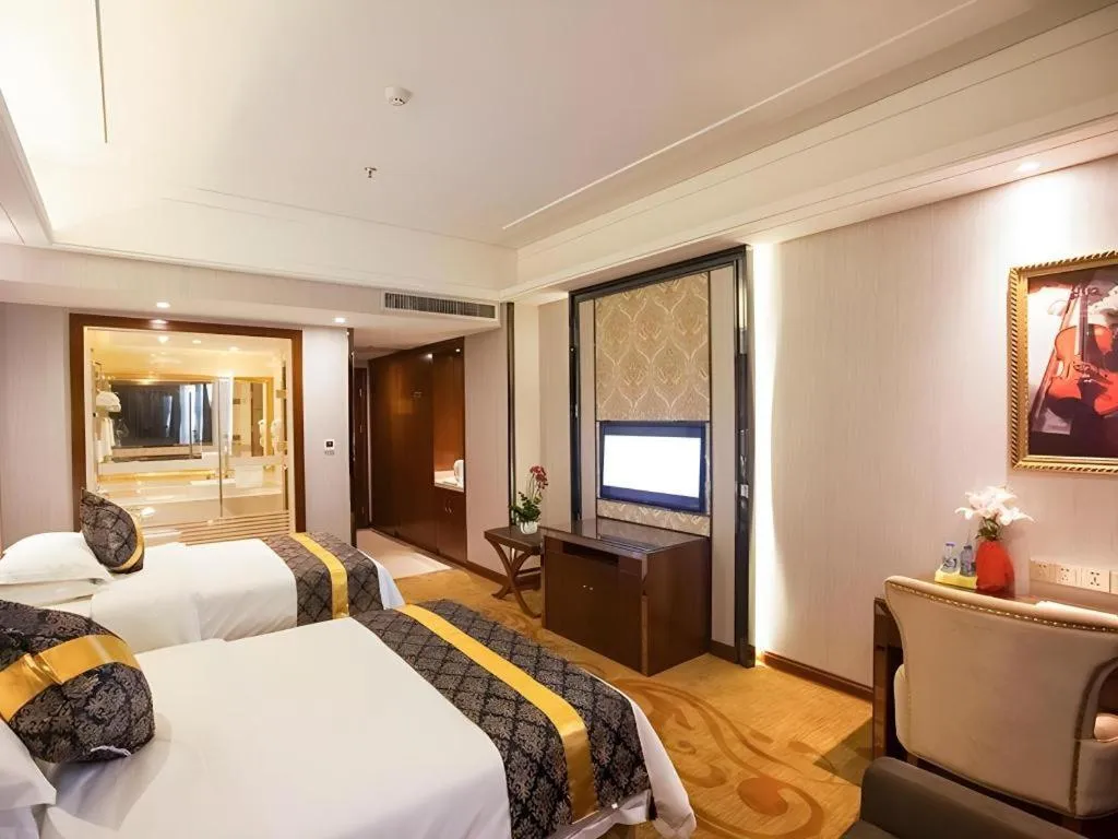 Bed in Vienna International Hotel Nanning Railway Station Mingxiu Road Metro Station