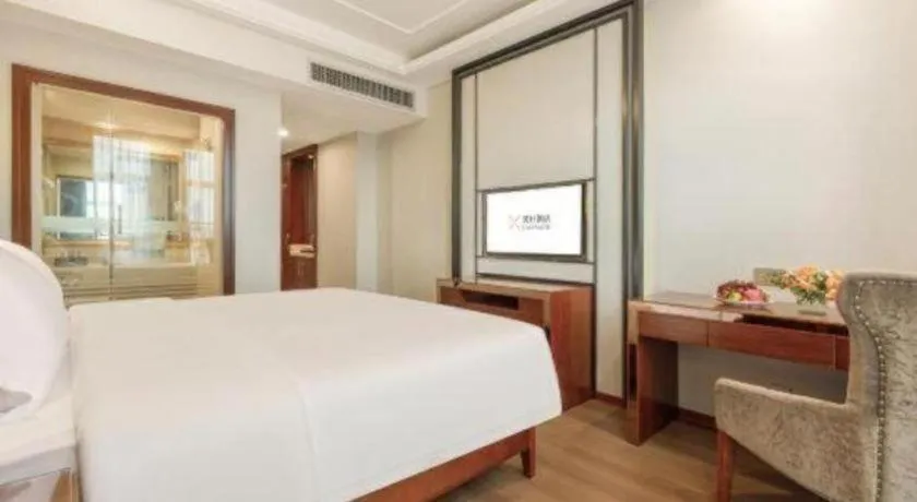 Bed in Vienna International Hotel Nanning Railway Station Mingxiu Road Metro Station