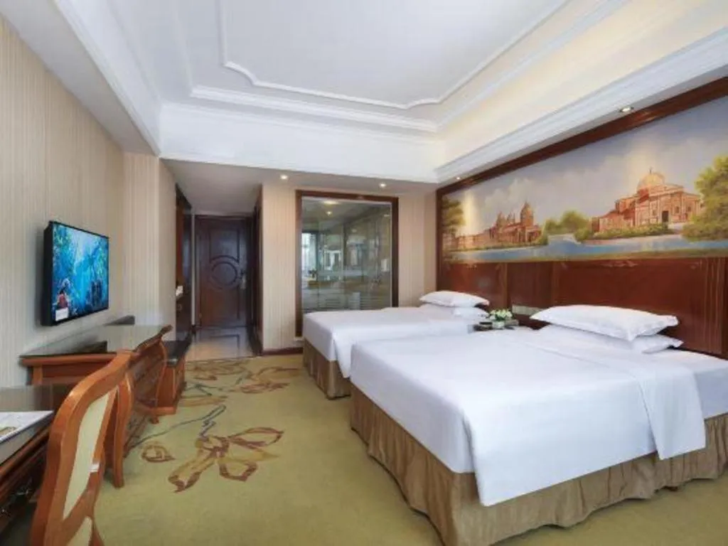 Bed in Vienna International Hotel Nanning Railway Station Mingxiu Road Metro Station