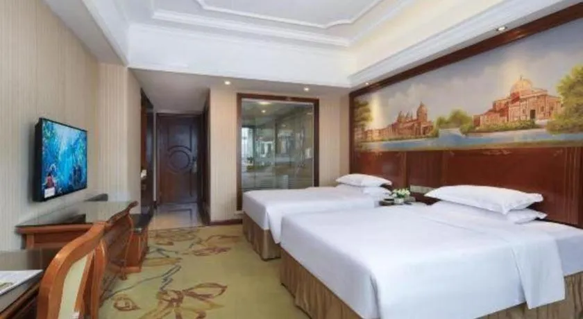 Bed in Vienna International Hotel Nanning Railway Station Mingxiu Road Metro Station