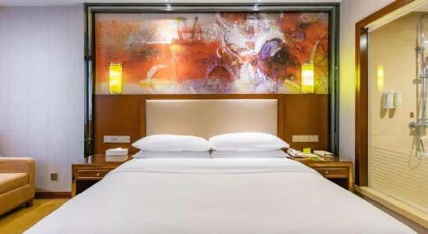 Bed in Vienna International Hotel Nanning Railway Station Mingxiu Road Metro Station