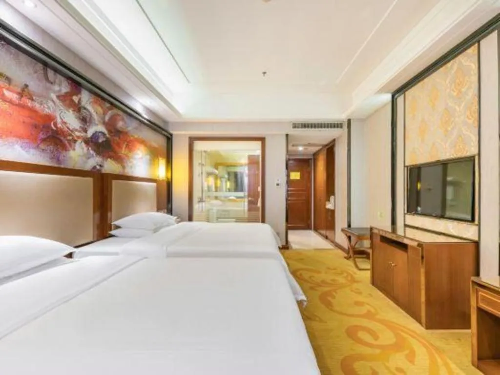 Bed in Vienna International Hotel Nanning Railway Station Mingxiu Road Metro Station