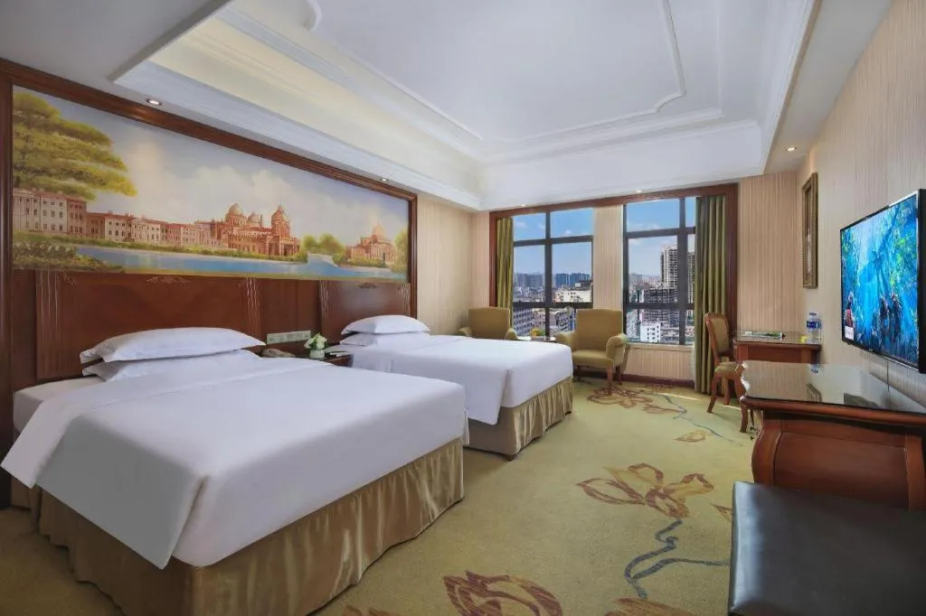 Bed in Vienna International Hotel Nanning Railway Station Mingxiu Road Metro Station