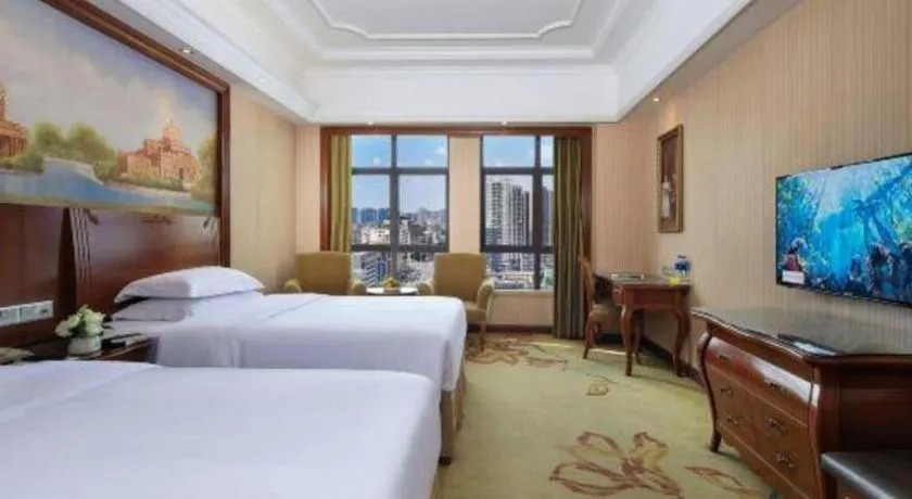 Bed in Vienna International Hotel Nanning Railway Station Mingxiu Road Metro Station