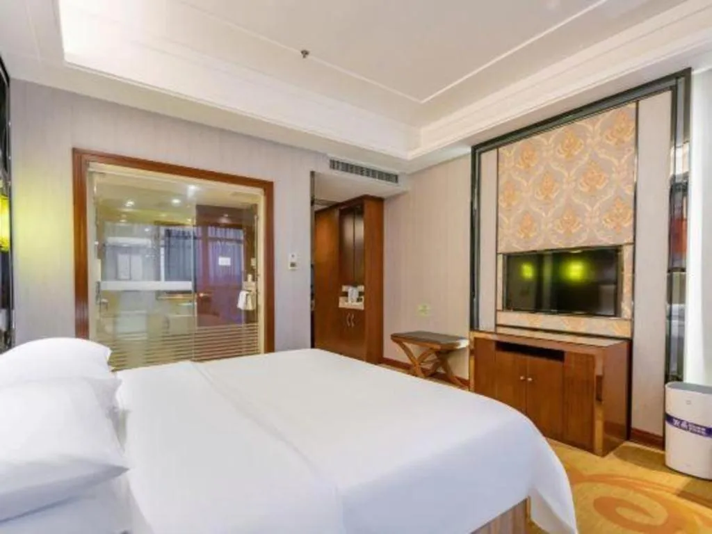 Bed in Vienna International Hotel Nanning Railway Station Mingxiu Road Metro Station