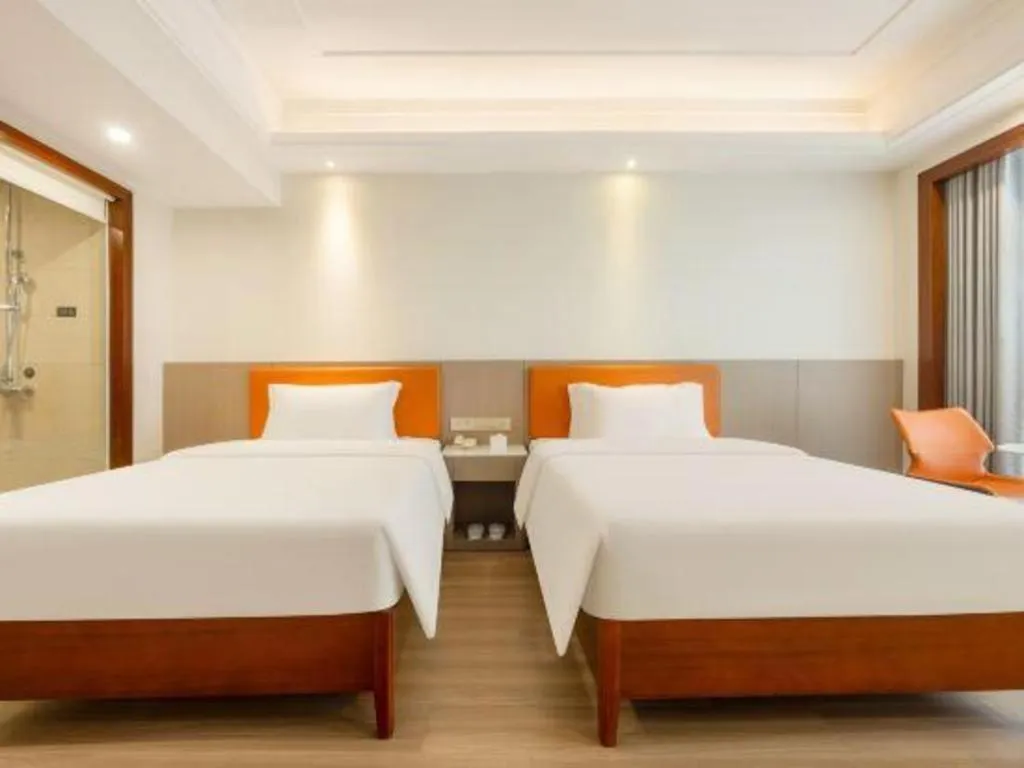 Bed in Vienna International Hotel Nanning Railway Station Mingxiu Road Metro Station