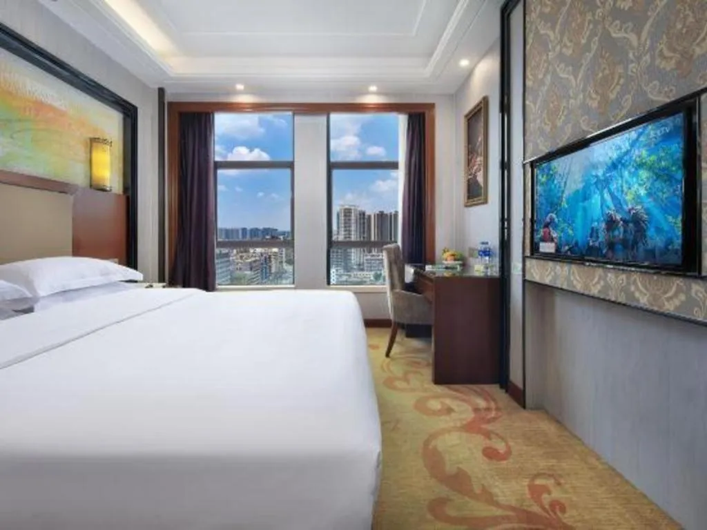 Bed in Vienna International Hotel Nanning Railway Station Mingxiu Road Metro Station