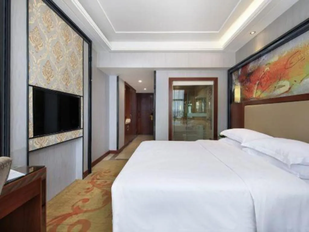 Bed in Vienna International Hotel Nanning Railway Station Mingxiu Road Metro Station