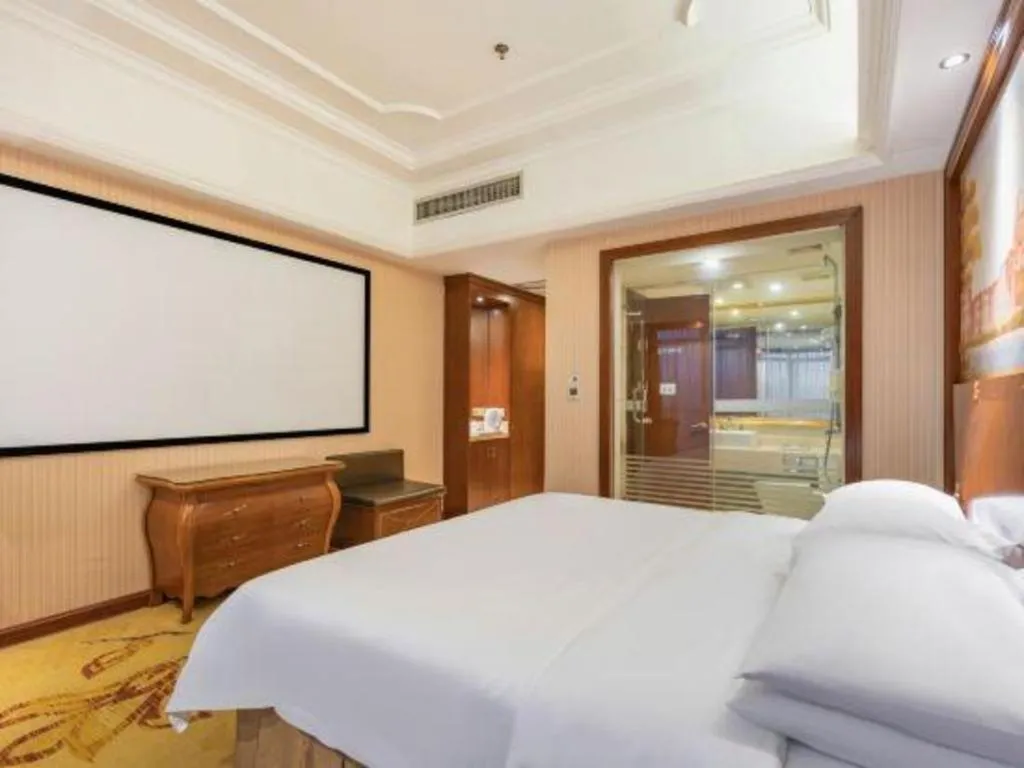 Bed in Vienna International Hotel Nanning Railway Station Mingxiu Road Metro Station