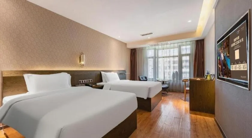 Bed in James Joyce Coffetel Chengdu Jianshe Road Dongjiao Jiyi Square