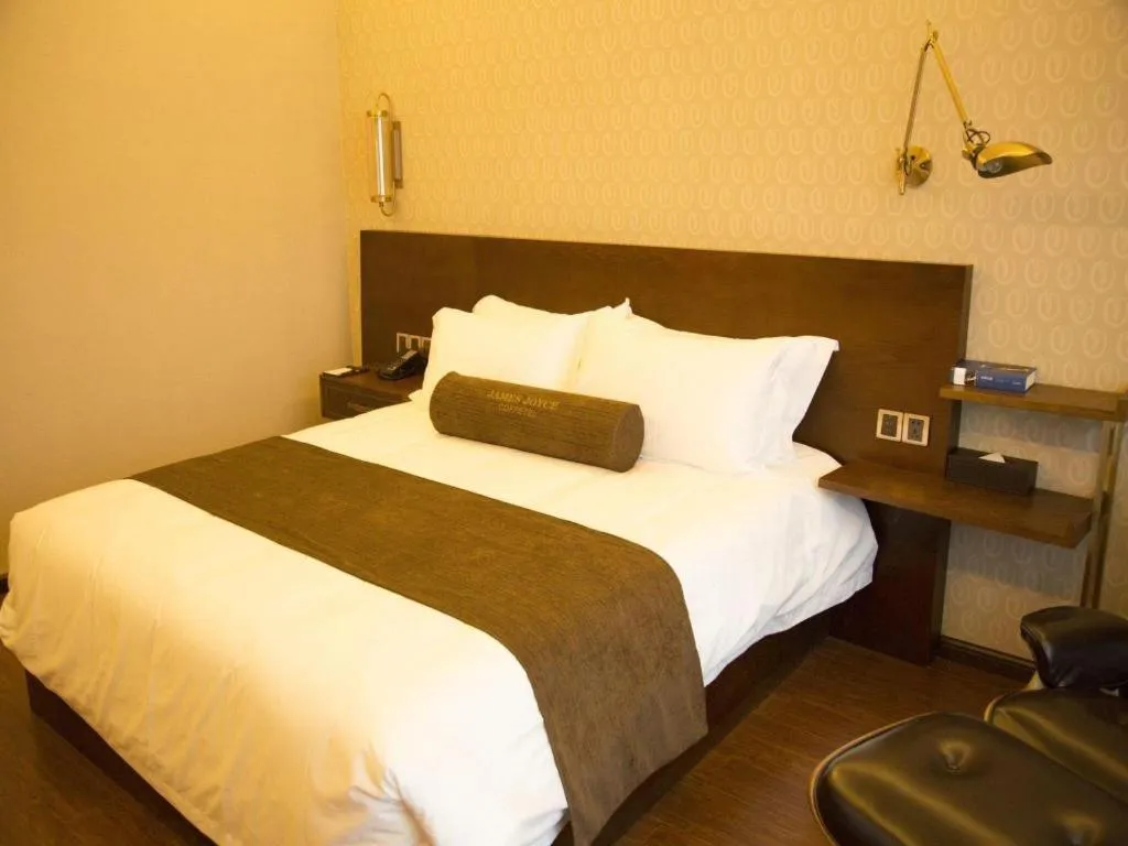 Bed in James Joyce Coffetel Chengdu Jianshe Road Dongjiao Jiyi Square