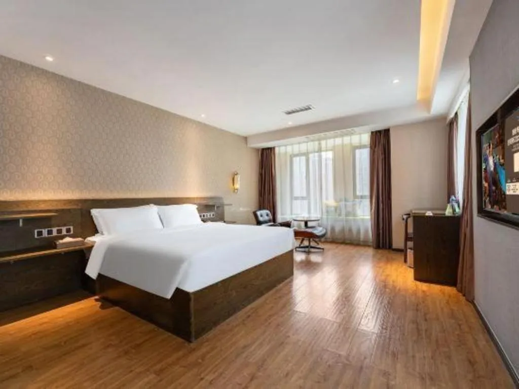 Bed in James Joyce Coffetel Chengdu Jianshe Road Dongjiao Jiyi Square